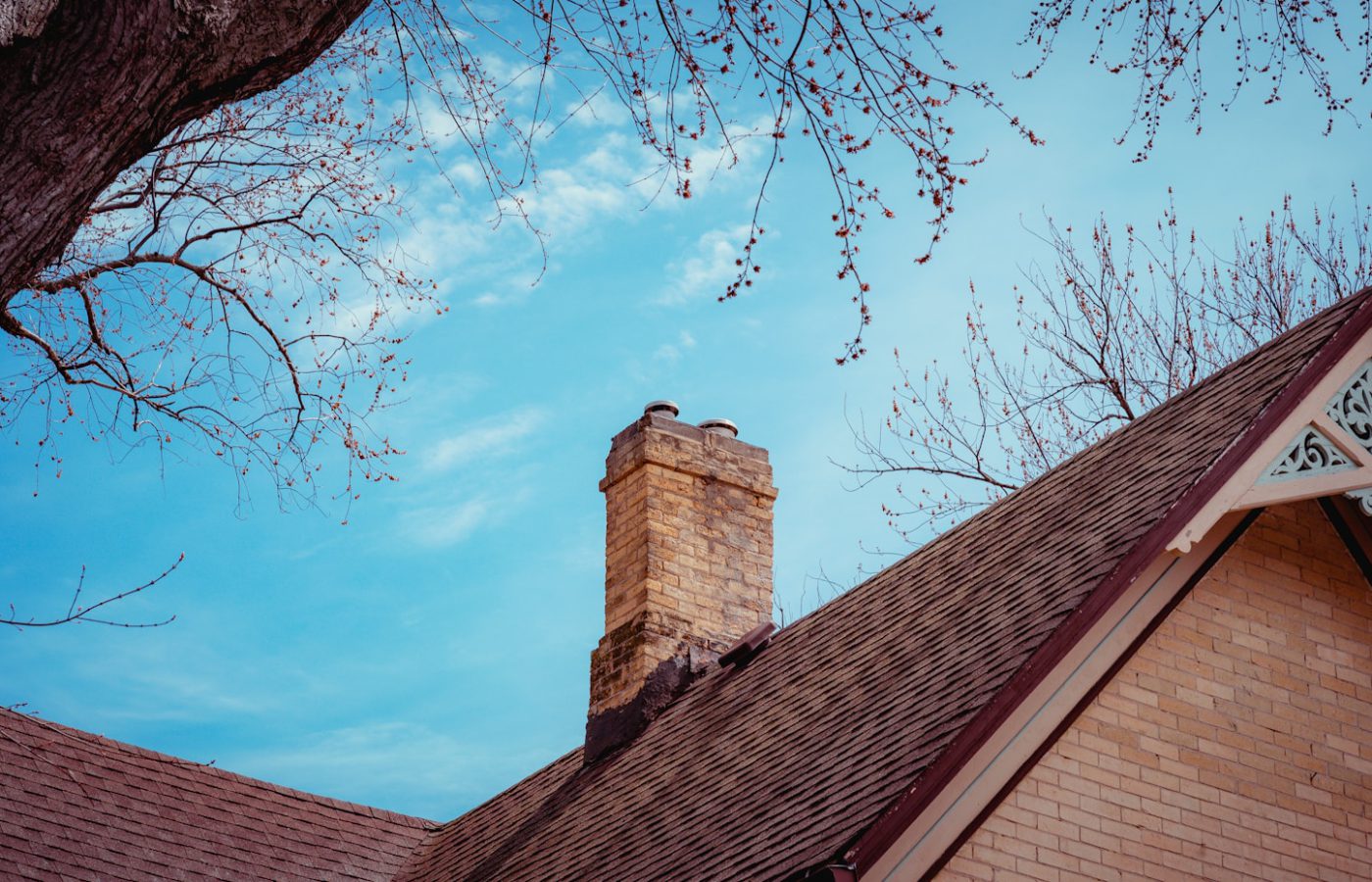 brown brick building under blue sky during daytime